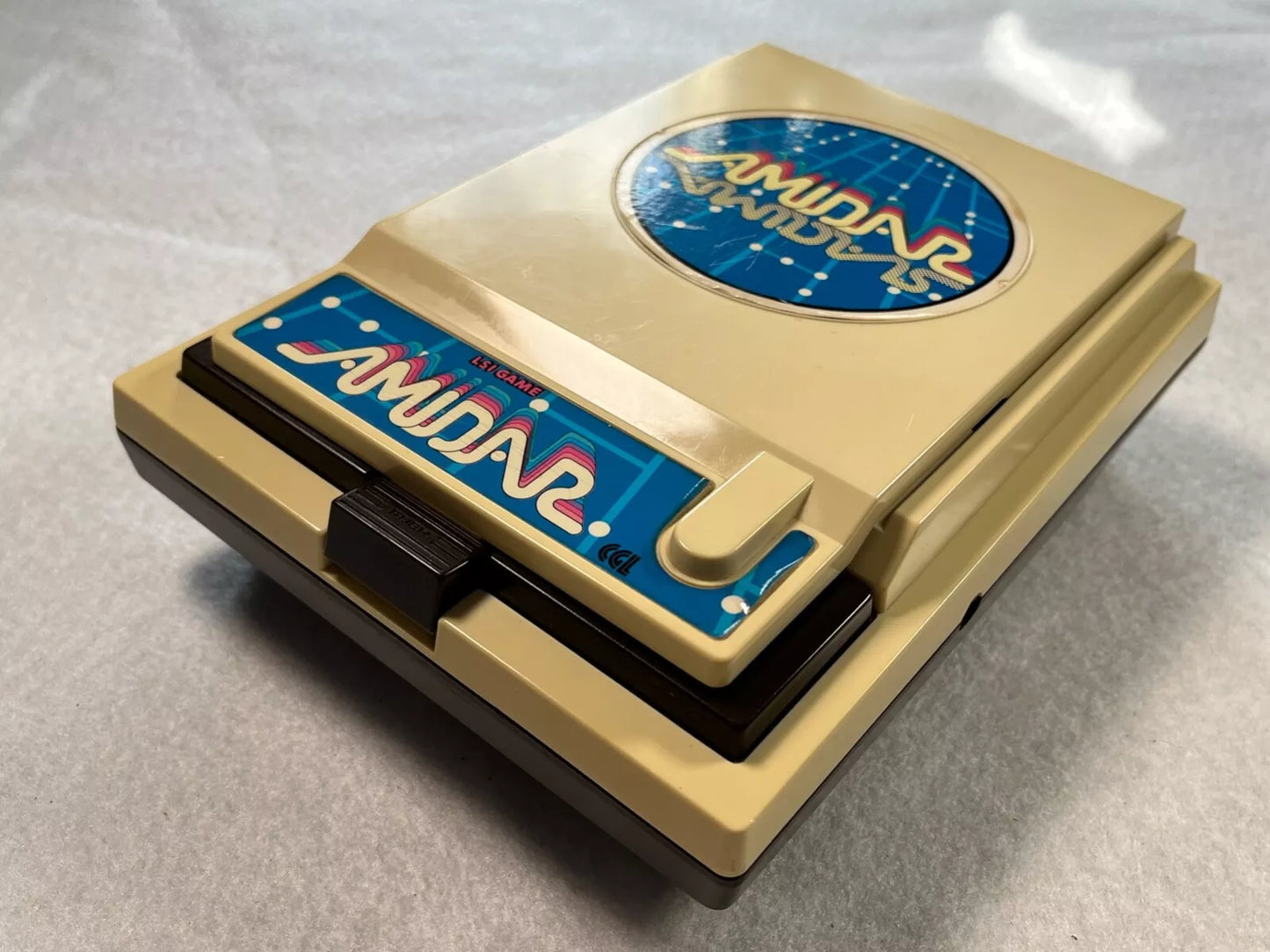 Amidar CGL Handheld Electronic Game