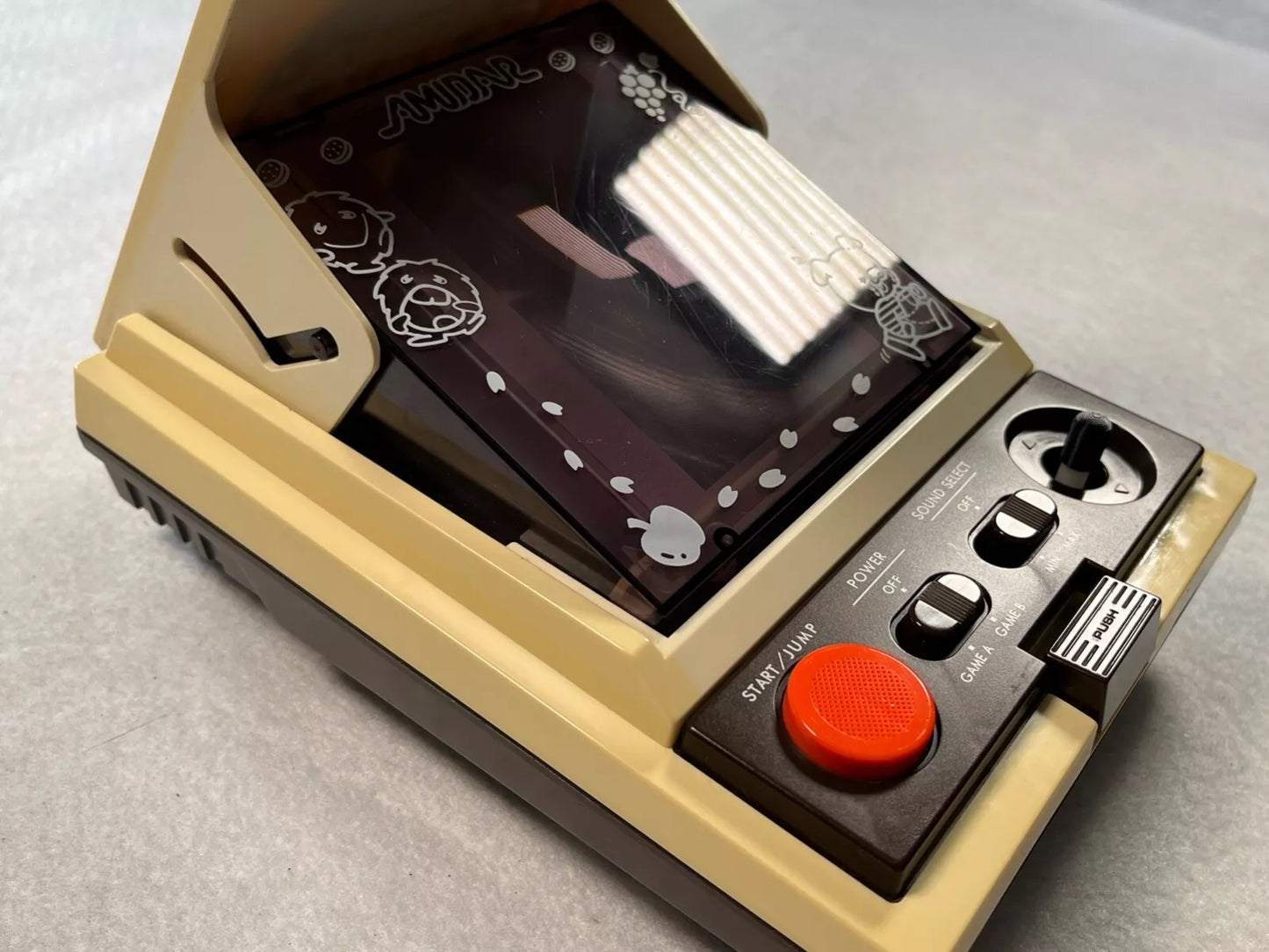 Amidar CGL Handheld Electronic Game