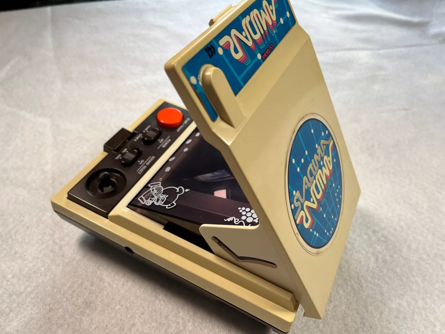 Amidar CGL Handheld Electronic Game