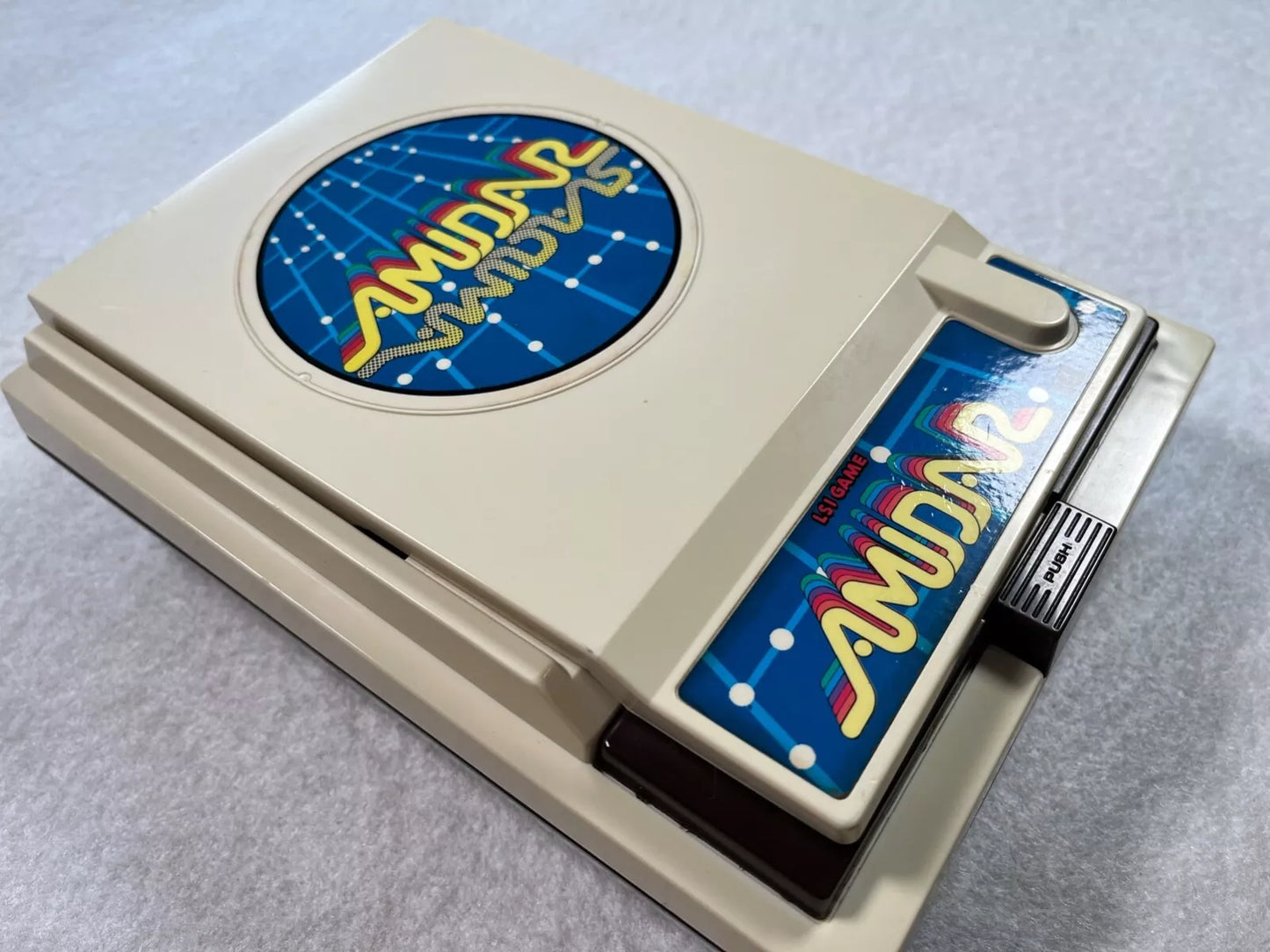 Amidar CGL Handheld Electronic Game