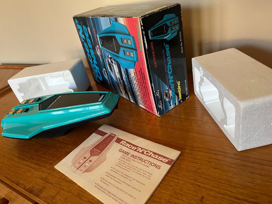 Race n Chase Bambino Handheld Electronic Game Boxed with Instructions